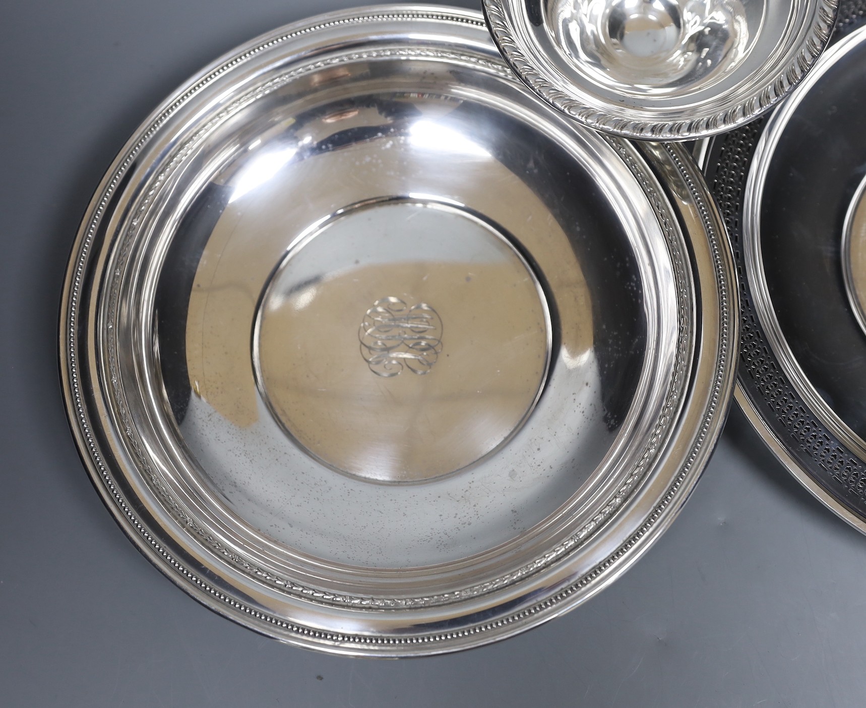 A pierced sterling shallow dish or stand, 24.5cm, a similar bowl and small pedestal dish